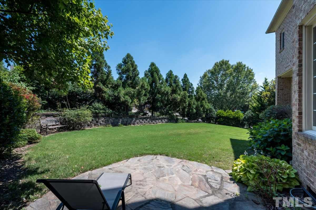 1917 Falls Farm Crossing Raleigh, NC 27614 - Photo 23 of 30 Flagstone Pad in backyard perfect for grilling or outdoor furniture.