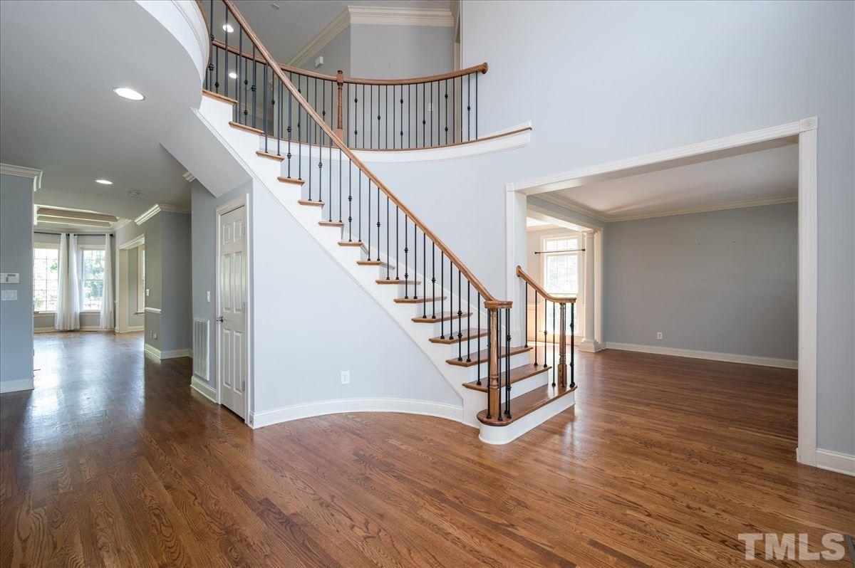 1917 Falls Farm Crossing Raleigh, NC 27614 - Photo 29 of 30 Dramatic Entry Stairwell in this home's foyer. Unique floorplan for John Weiland, semi-custom builder for River Run.