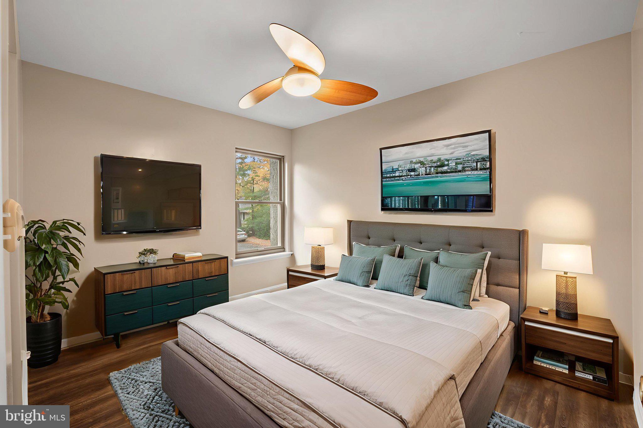 1813 Glade Court Annapolis, MD 21403 - Photo 25 of 35 a bedroom with a bed and a flat screen tv