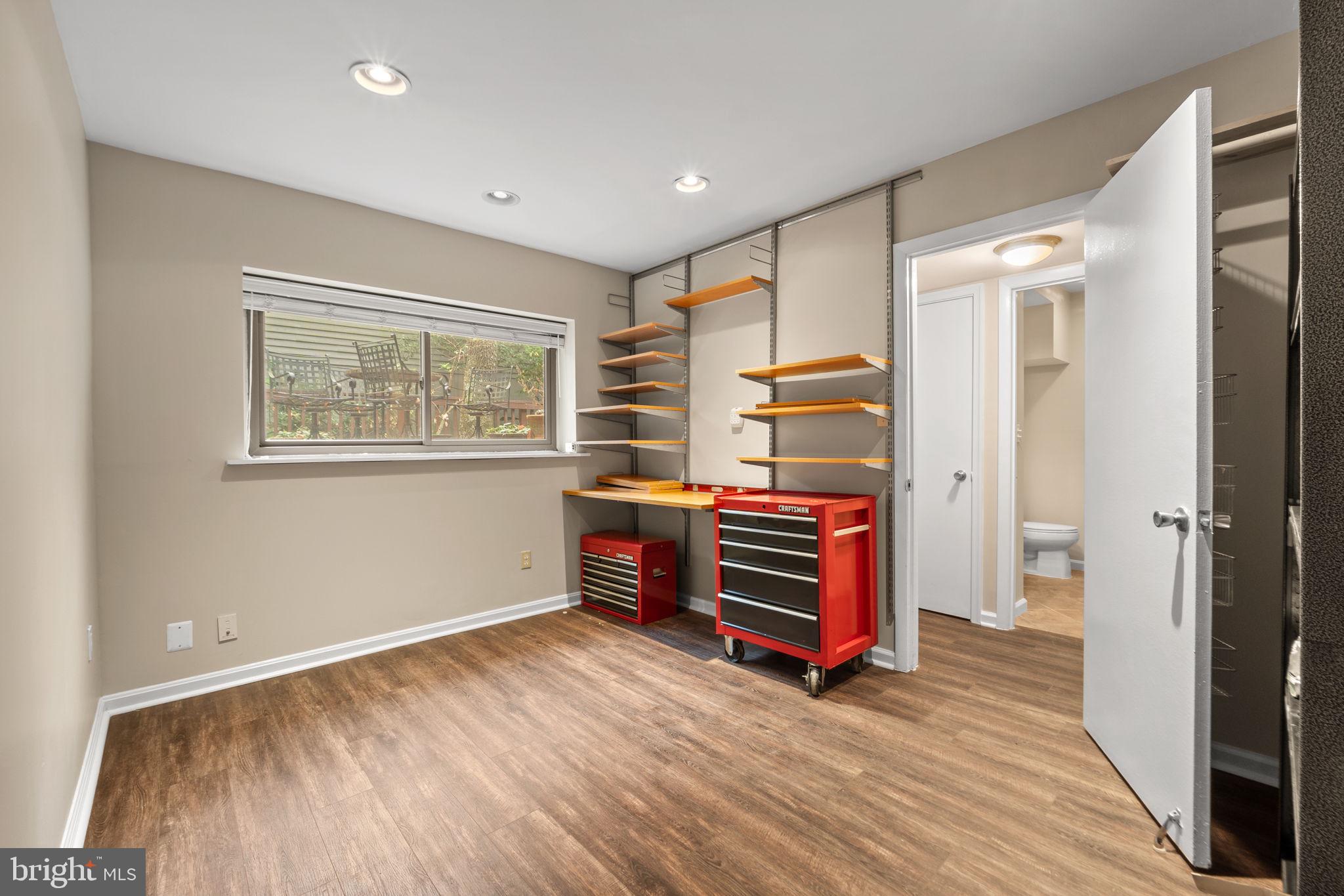 1813 Glade Court Annapolis, MD 21403 - Photo 30 of 35 an empty room with wooden floor and window