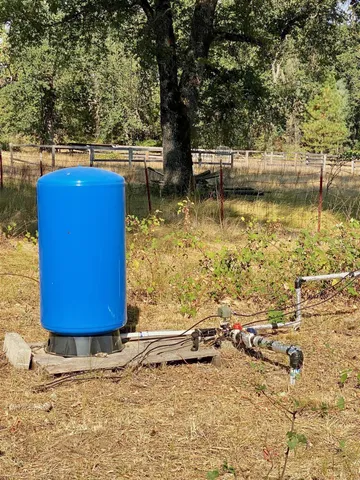 a view of yard covered with snow
