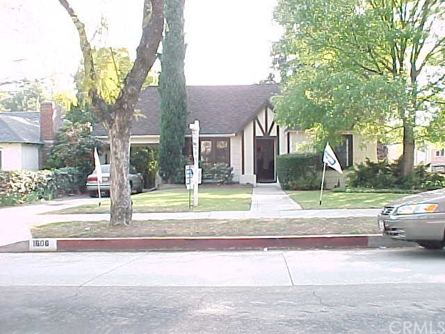 1606 West Kenneth Road Glendale, CA 91201 - Photo 1 of 1 front view of a house with a yard