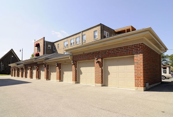 229 South Main Street, Unit 2E Lombard, IL 60148 - Photo 16 of 17 a front view of a house with a garage