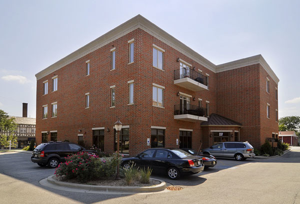 229 South Main Street, Unit 2E Lombard, IL 60148 - Photo 2 of 17 a car parked in front of a building
