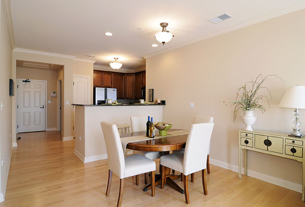 229 South Main Street, Unit 2E Lombard, IL 60148 - Photo 5 of 17 a view of a dining room with furniture and wooden floor
