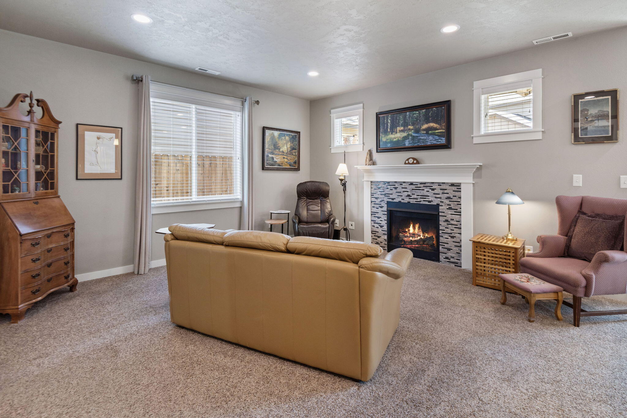 715 Brooks Camp Road Sisters, OR 97759 - Photo 3 of 25 a living room with furniture and a fireplace