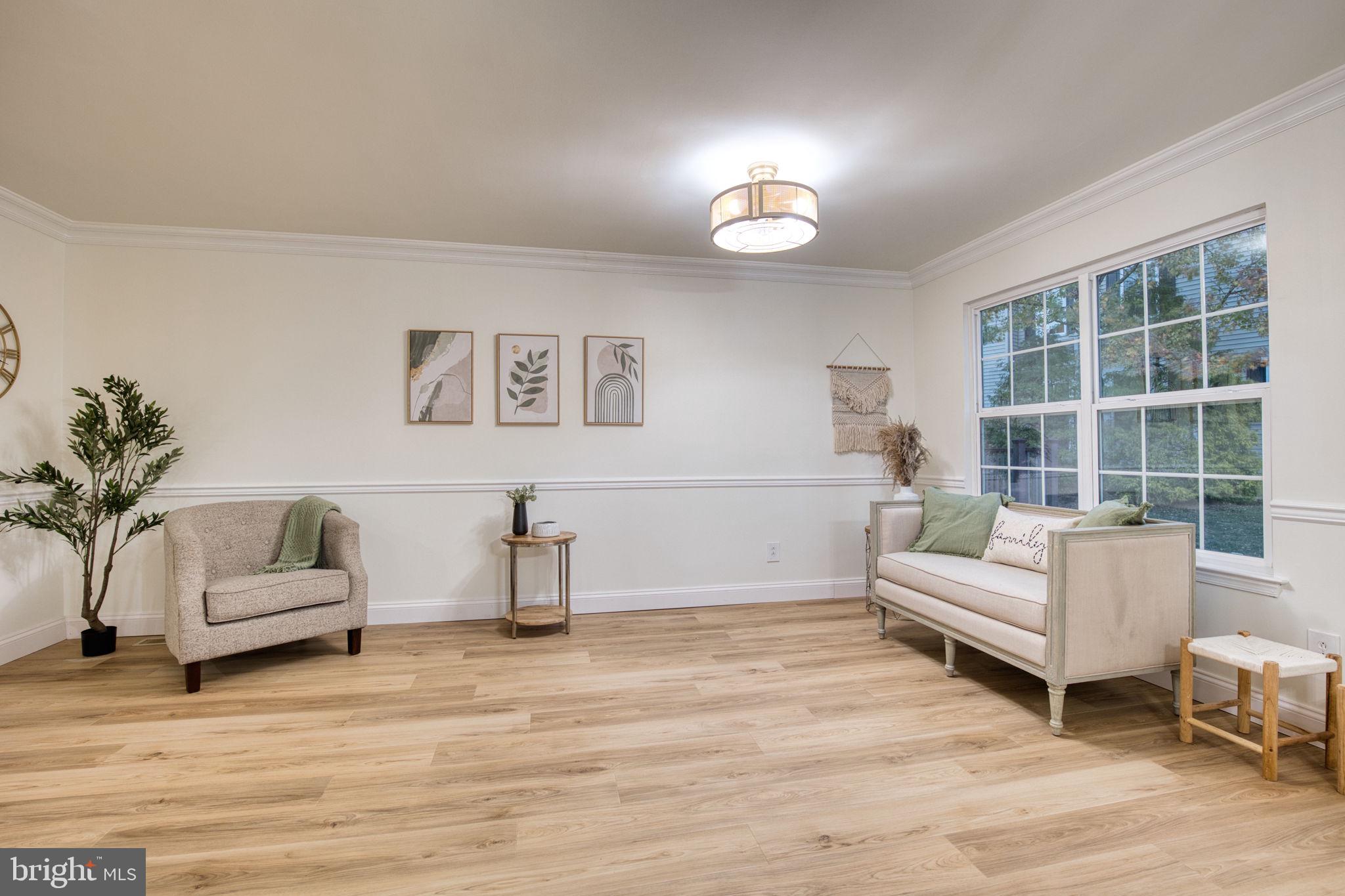 107 Walker Road Royersford, PA 19468 - Photo 12 of 41 a living room with furniture and a large window