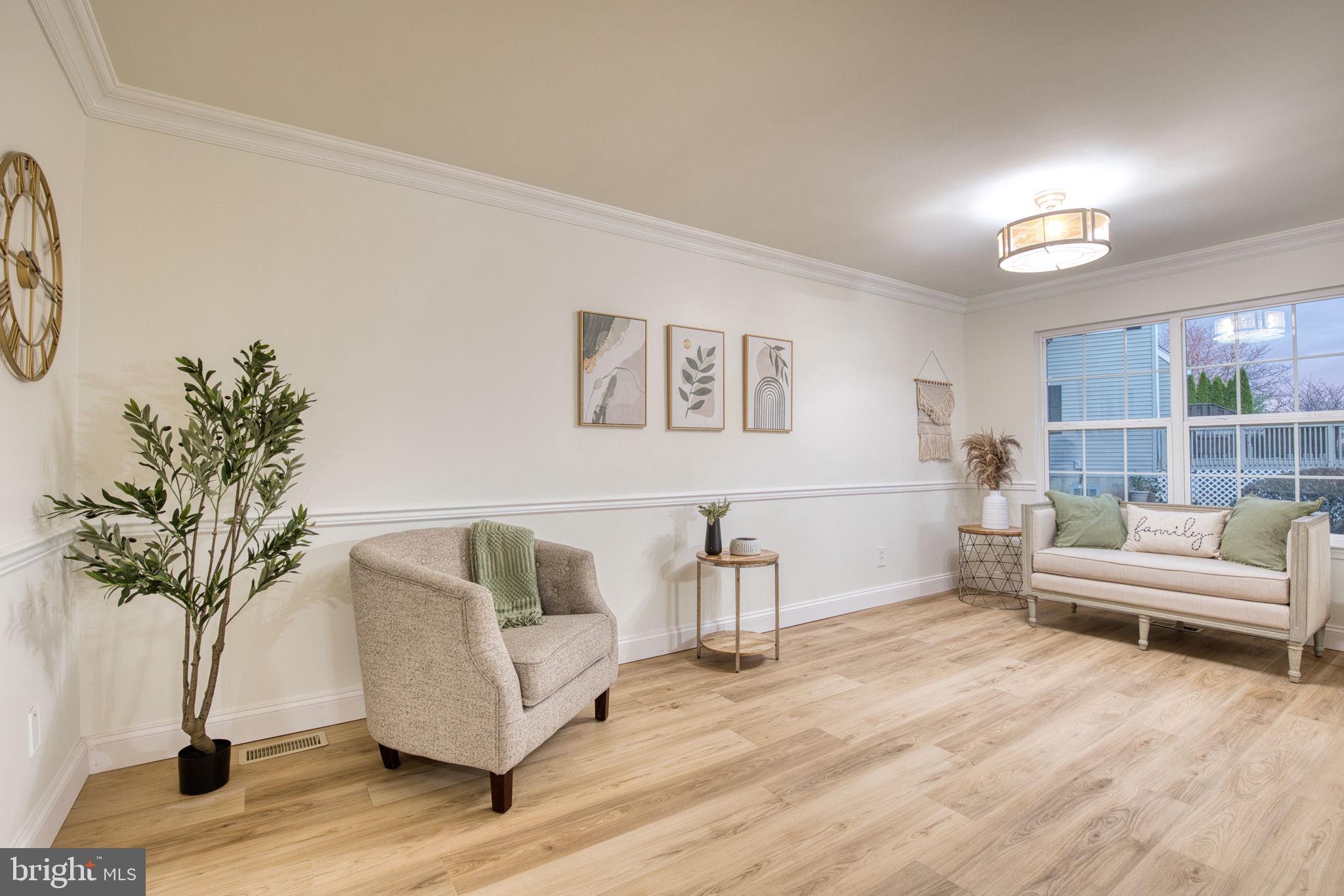 107 Walker Road Royersford, PA 19468 - Photo 13 of 41 a living room with furniture and a potted plant