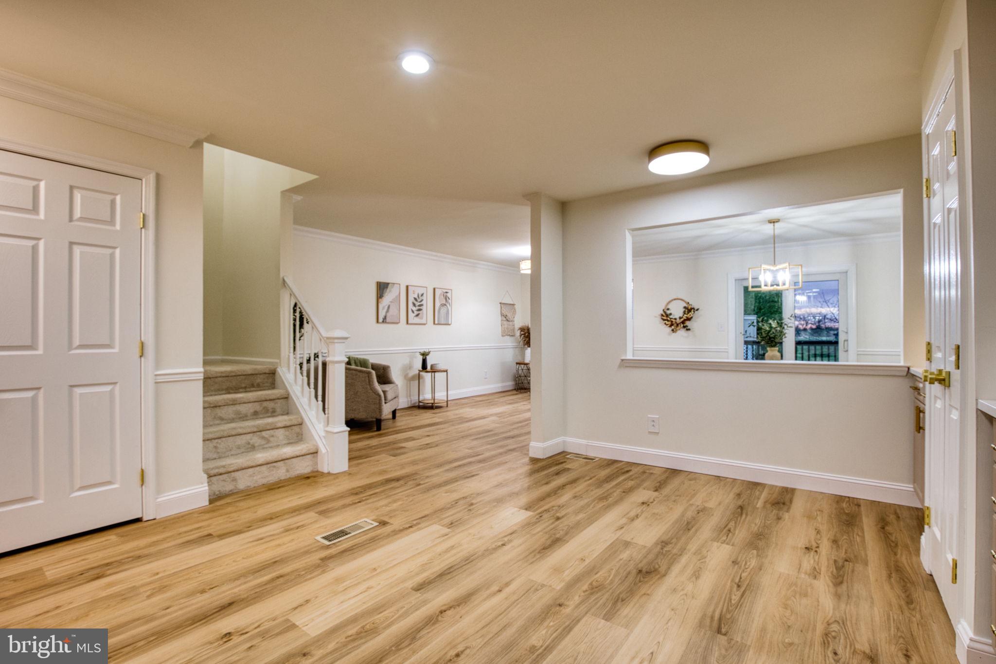 107 Walker Road Royersford, PA 19468 - Photo 16 of 41 an empty room with wooden floor and fire place