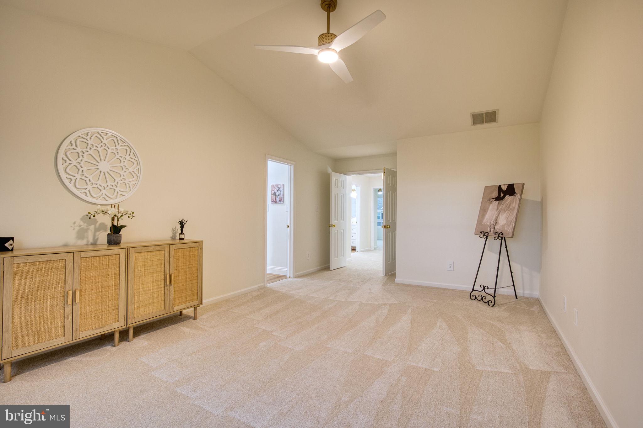 107 Walker Road Royersford, PA 19468 - Photo 18 of 41 a view of a room with cabinet mirror and a ceiling fan