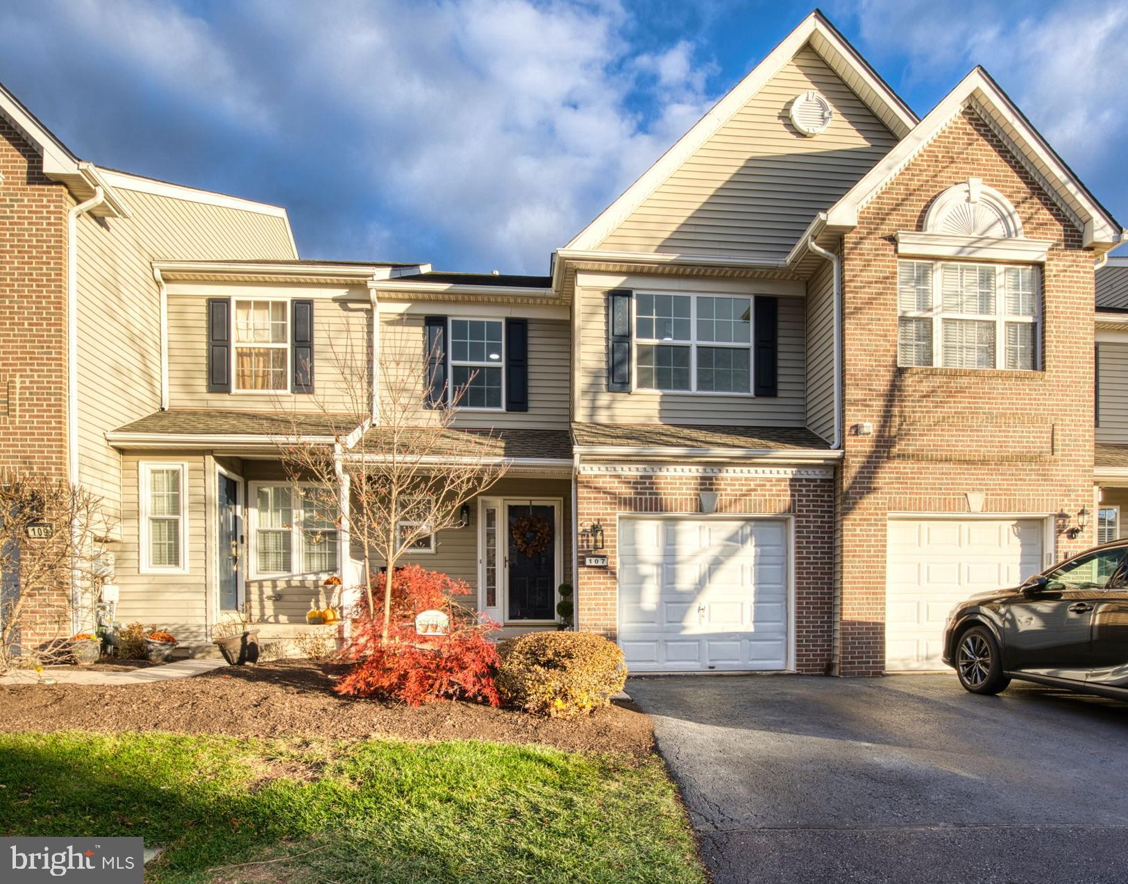 107 Walker Road Royersford, PA 19468 - Photo 2 of 41 a front view of a house with a yard outdoor seating and garage
