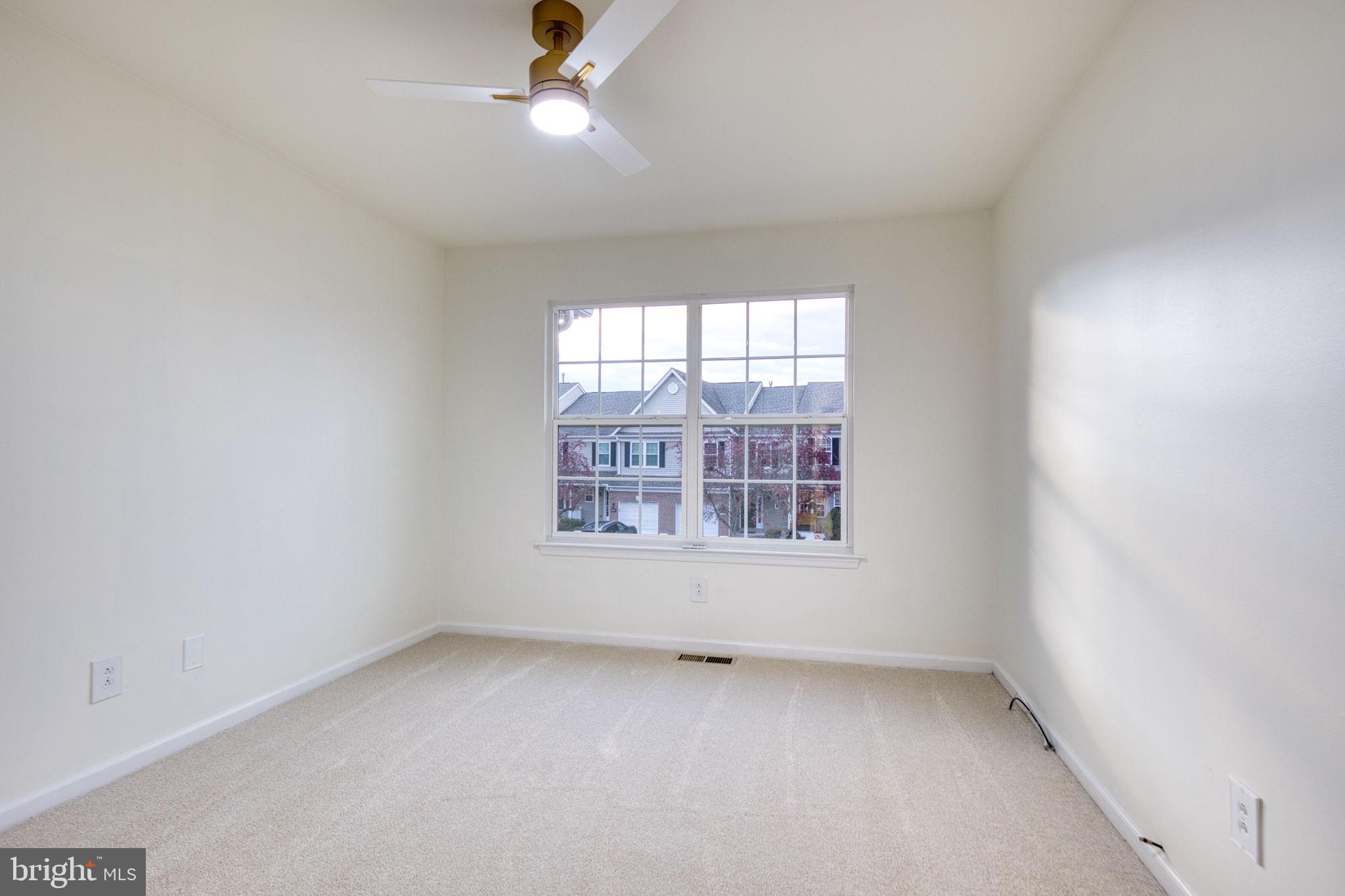 107 Walker Road Royersford, PA 19468 - Photo 27 of 41 an empty room with a window and a fan
