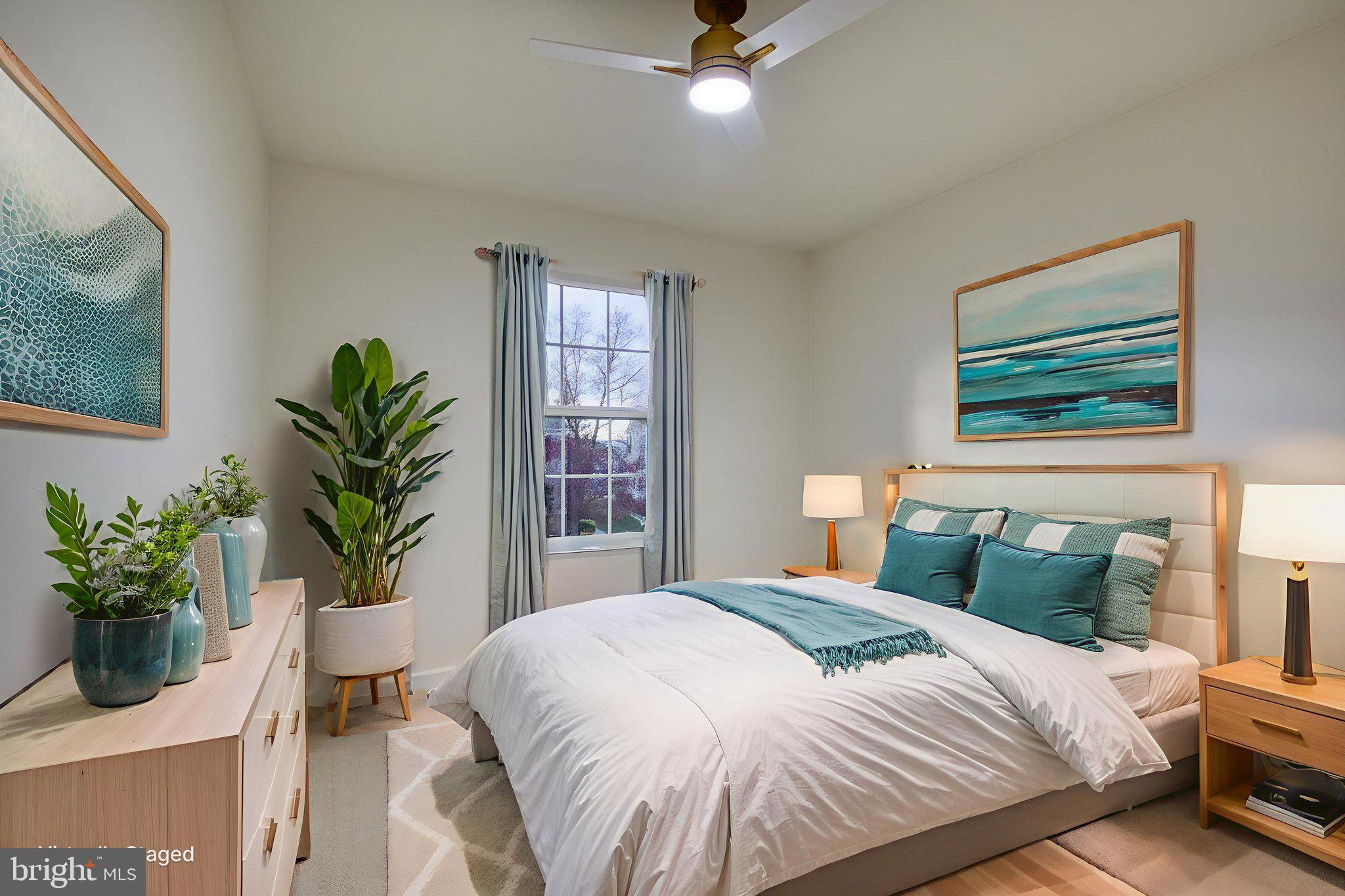 107 Walker Road Royersford, PA 19468 - Photo 31 of 41 a bedroom with a bed and a potted plant