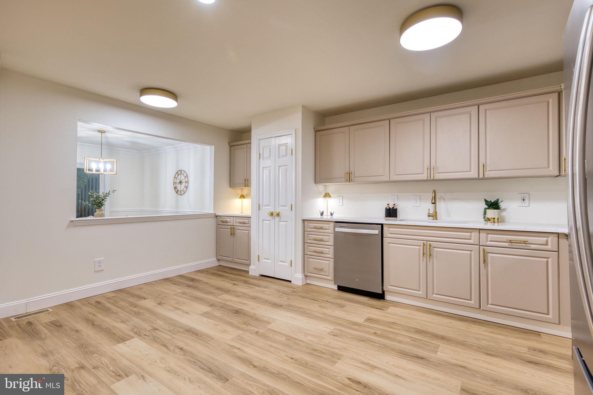 107 Walker Road Royersford, PA 19468 - Photo 7 of 41 a kitchen with granite countertop white cabinets and white appliances