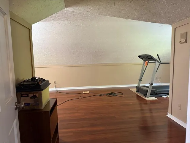 a room with furniture and a large window