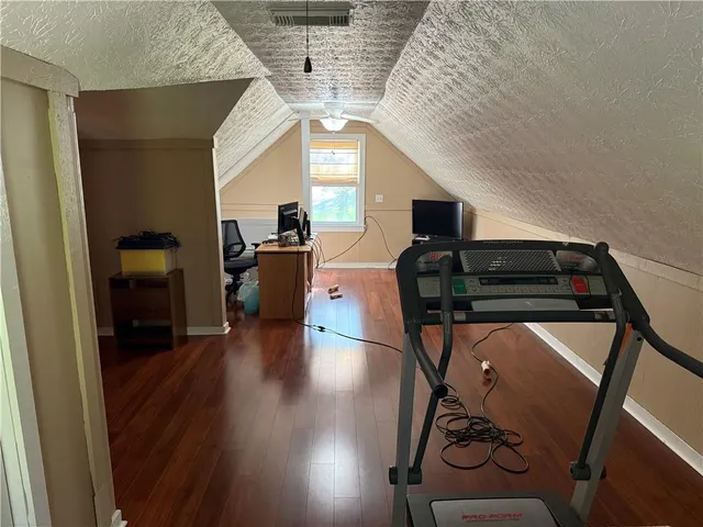 a living room with a furniture and a window