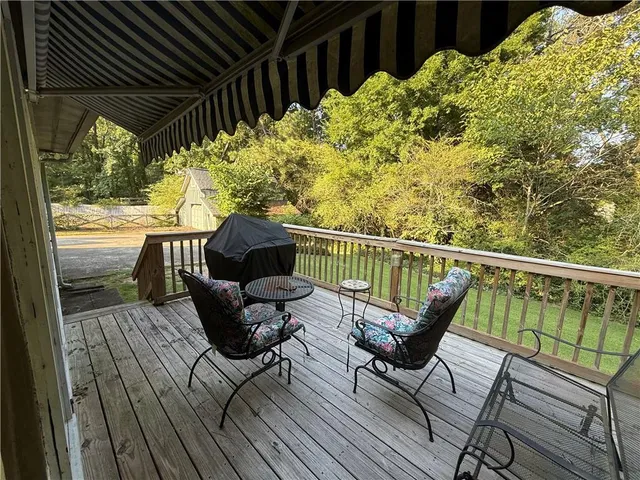 a house with trees in the background