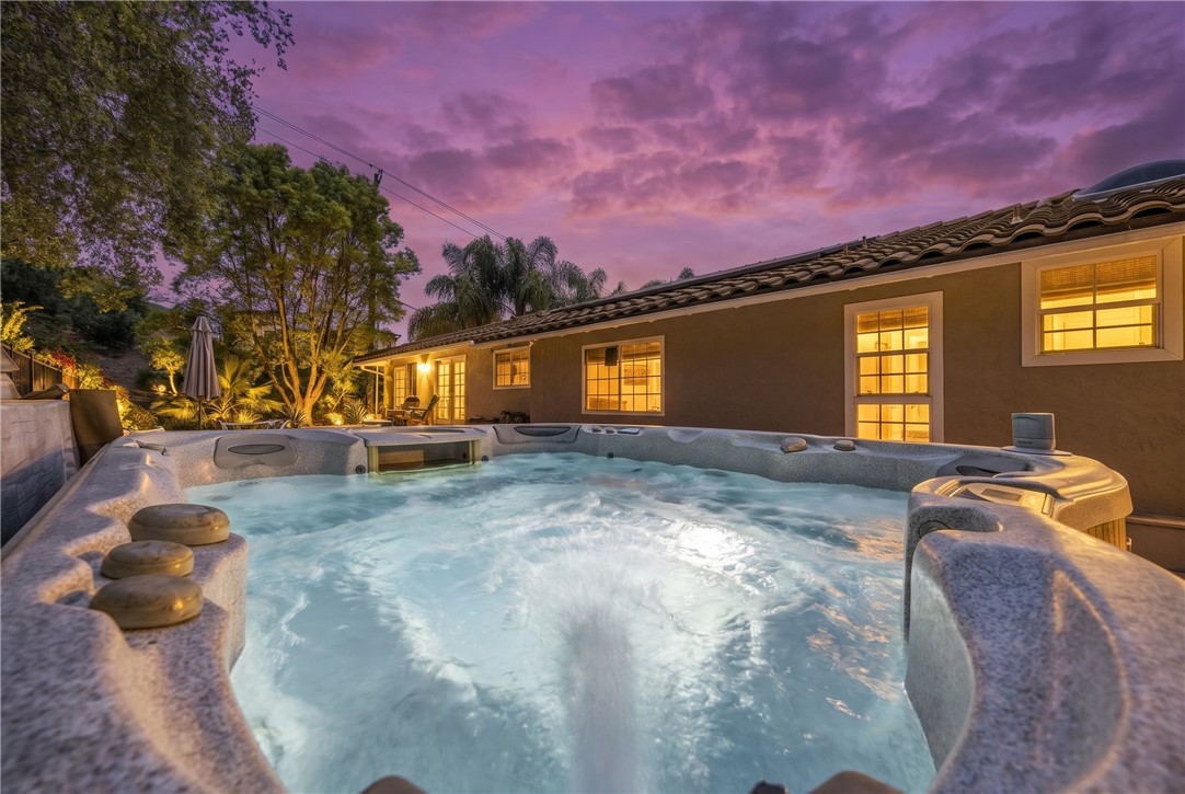 1485 Vía Ladera Fallbrook, CA 92028 - Photo 36 of 43 a backyard of a house with table and chairs