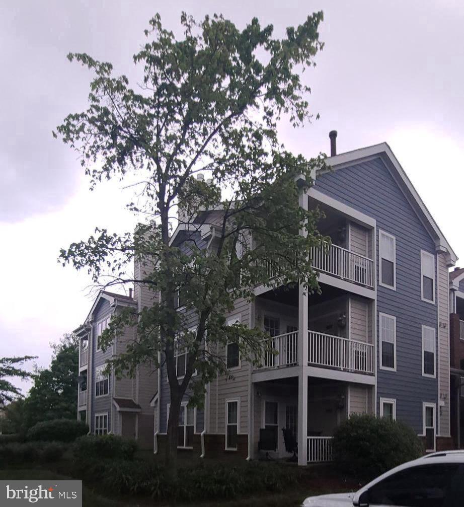 20958 Timber Ridge Terrace, Unit 201 Ashburn, VA 20147 - Photo 2 of 20 Bright second level Unit with balcony