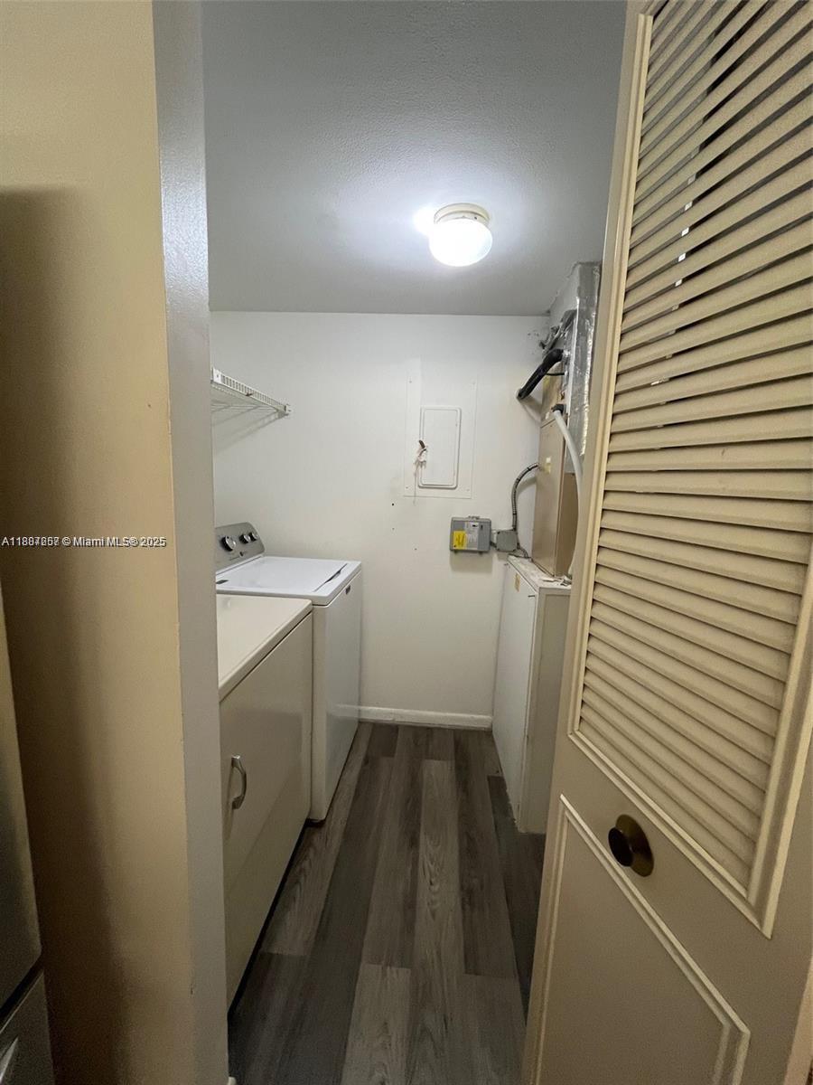 512 Shady Pine Way, Unit D2 Greenacres, FL 33415 - Photo 16 of 16 a bathroom with a sink a toilet and shower