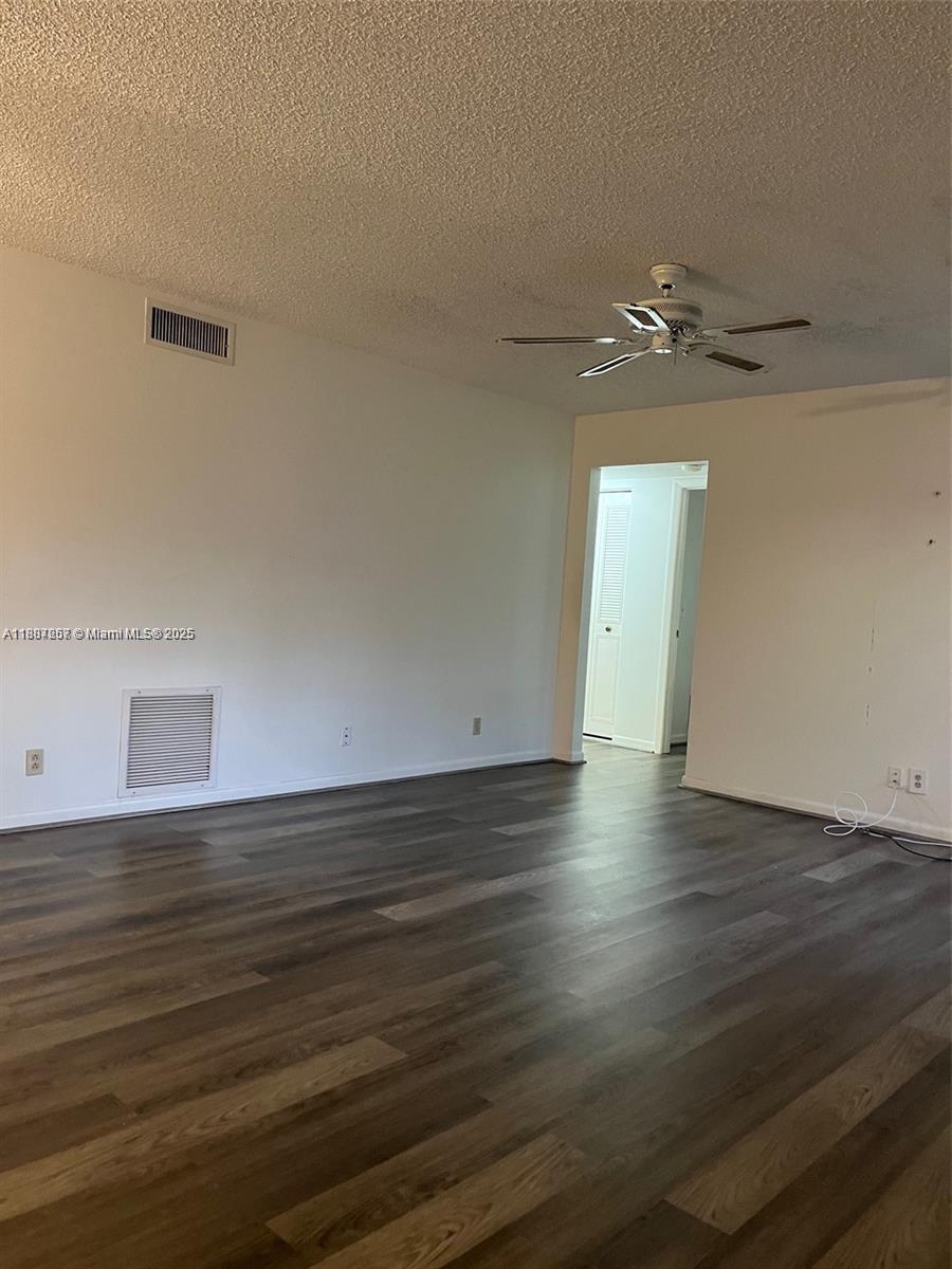 512 Shady Pine Way, Unit D2 Greenacres, FL 33415 - Photo 7 of 16 a view of a room with wooden floor