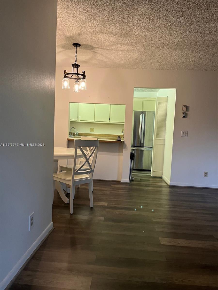 512 Shady Pine Way, Unit D2 Greenacres, FL 33415 - Photo 8 of 16 a view of kitchen with furniture and wooden floor