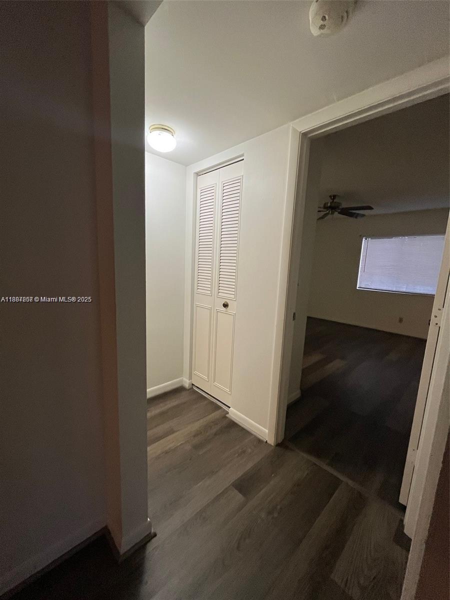 512 Shady Pine Way, Unit D2 Greenacres, FL 33415 - Photo 10 of 16 an empty room with wooden floor