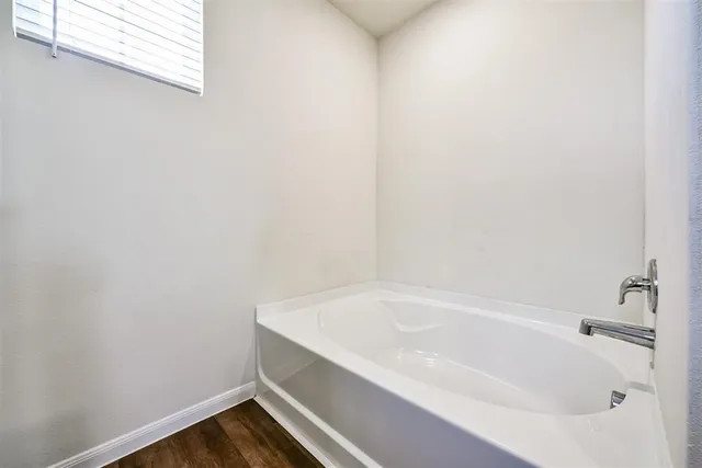 a bathroom with a bathtub