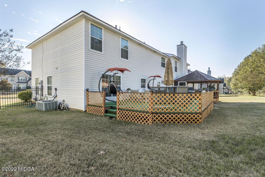 825 Kohl Drive McDonough, GA 30253 - Photo 46 of 59 a front view of a house with a yard