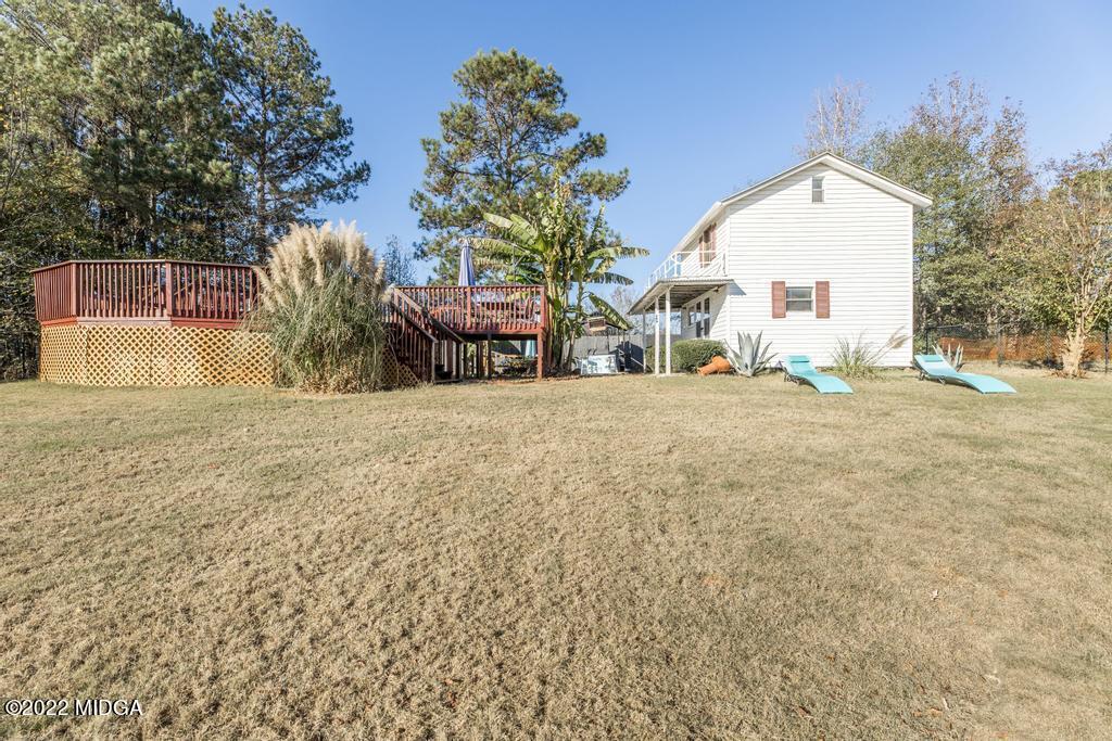825 Kohl Drive McDonough, GA 30253 - Photo 49 of 59 a view of a house with a yard