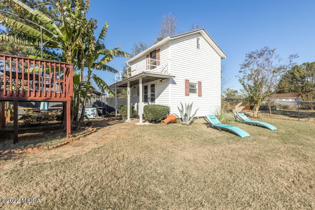 825 Kohl Drive McDonough, GA 30253 - Photo 54 of 59 a view of a house with a yard and garage