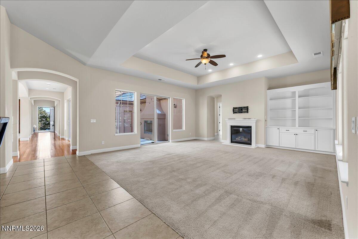 16920 Delacroix Reno, NV 89511 - Photo 16 of 25 a view of an empty room with a fireplace and a window