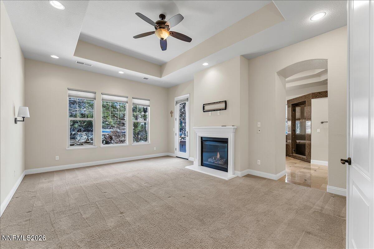 16920 Delacroix Reno, NV 89511 - Photo 17 of 25 a view of an empty room with a fireplace and a window