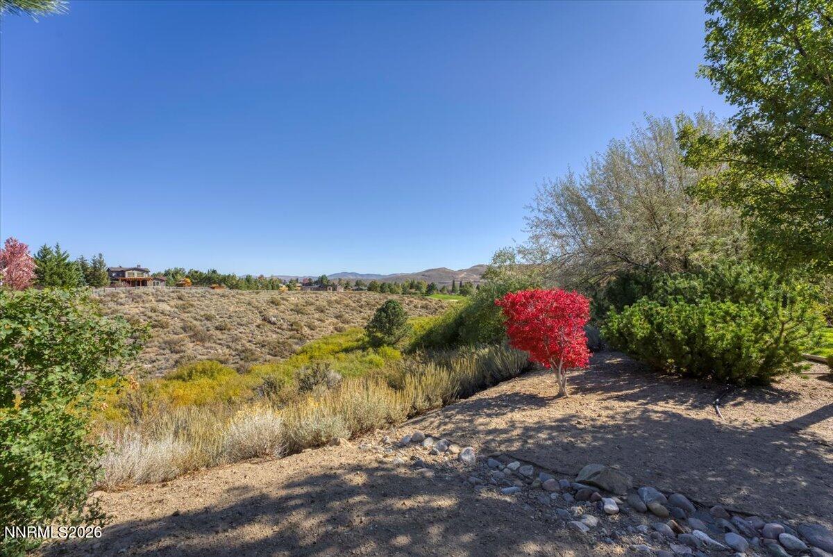 16920 Delacroix Reno, NV 89511 - Photo 2 of 25 a view of a road with an ocean view