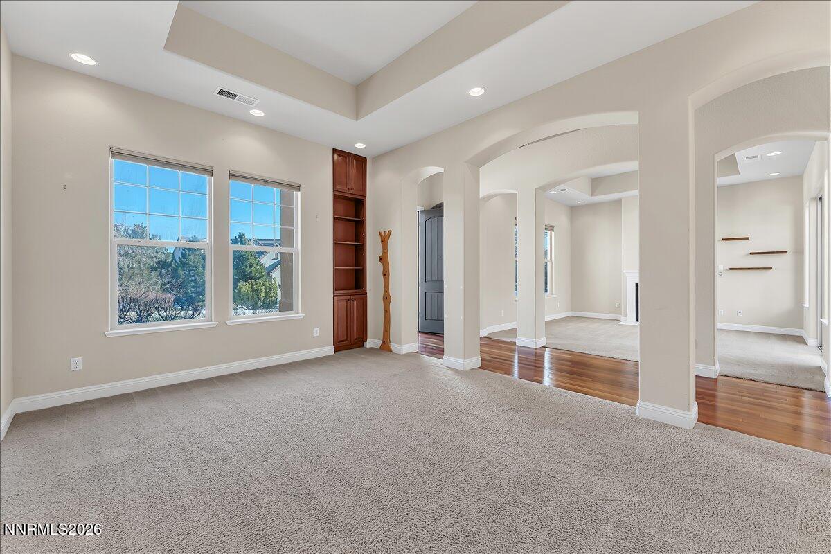 16920 Delacroix Reno, NV 89511 - Photo 9 of 25 an empty room with windows and view of bathroom
