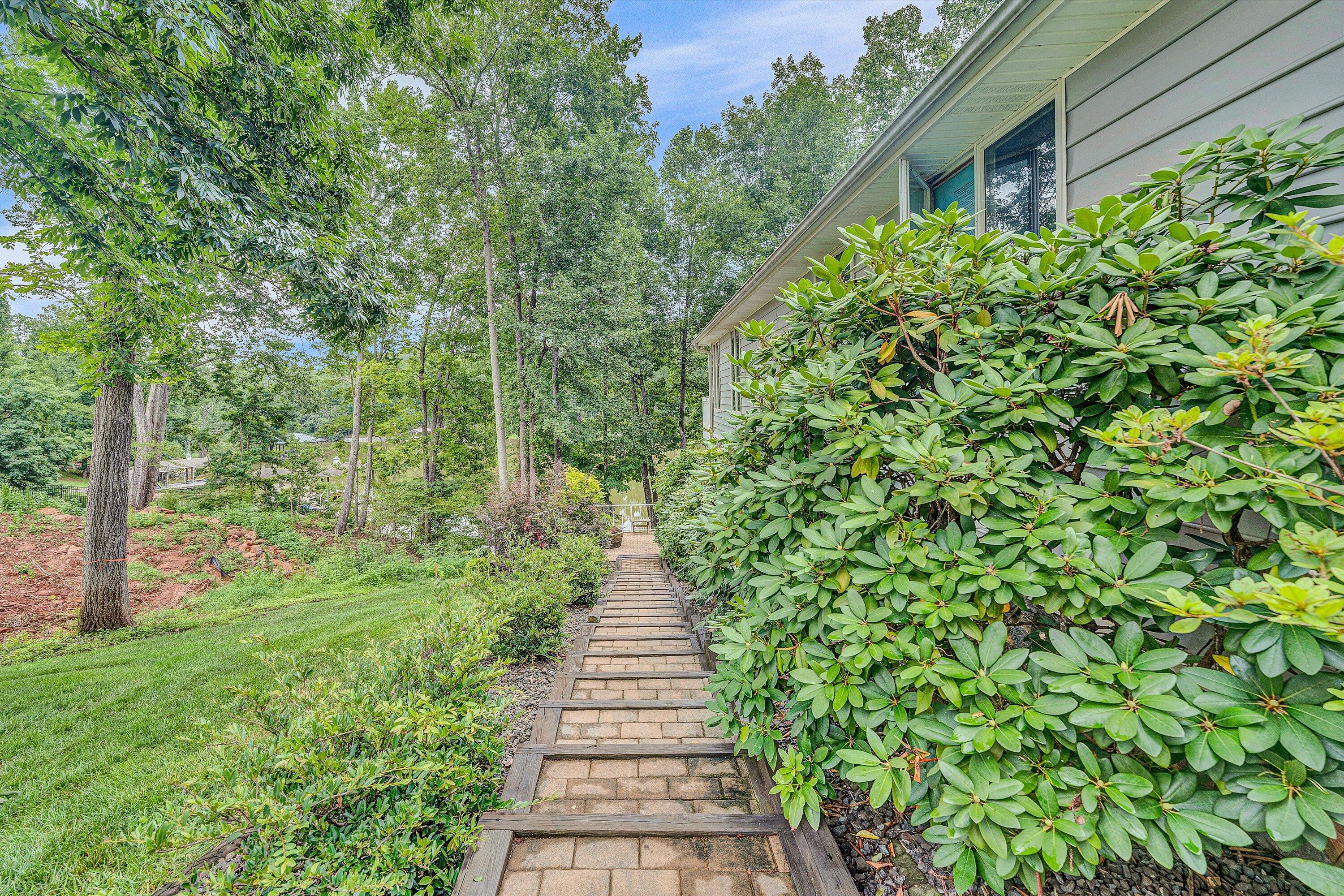 239 Cedar Bay Road Union Hall, VA 24176 - Photo 42 of 51 a view of a pathway of a garden