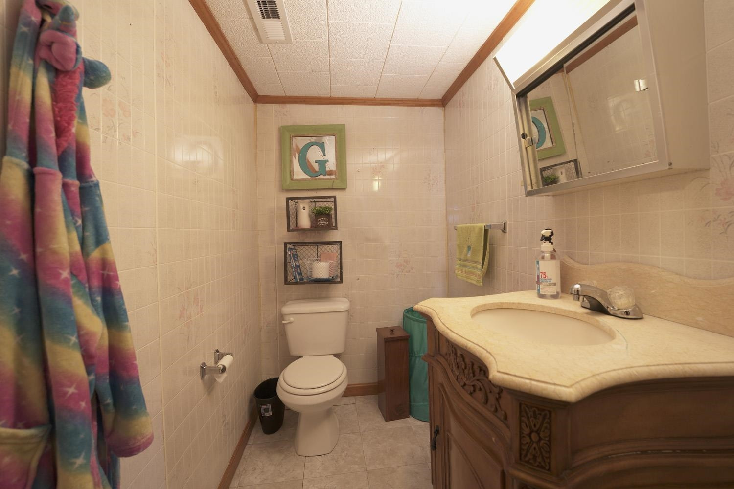 526 Janes Mill Road Gleason, TN 38229 - Photo 11 of 16 a bathroom with a sink a toilet and mirror