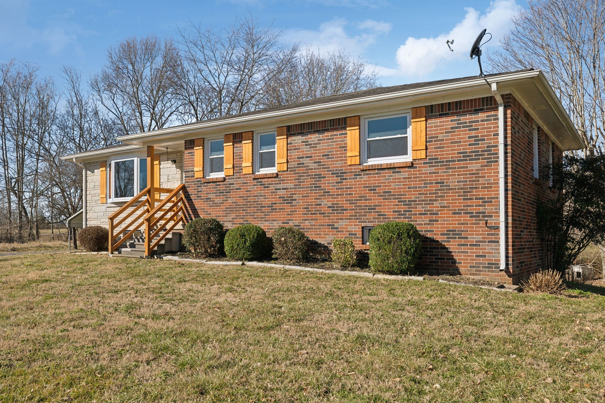 5880 Carthage Road Pleasant Shade, TN 37145 - Photo 42 of 45 a front view of a house with a yard