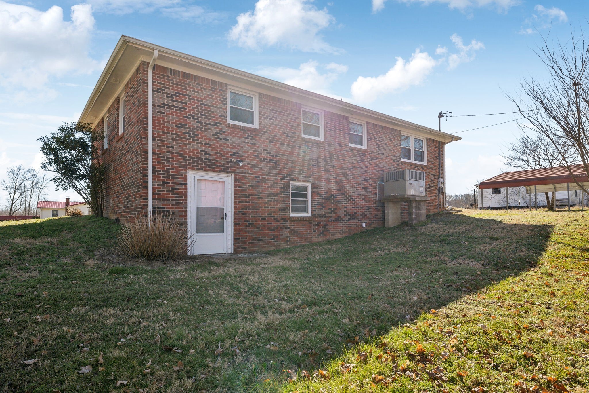 5880 Carthage Road Pleasant Shade, TN 37145 - Photo 45 of 45 a brick building sitting in middle of the yard