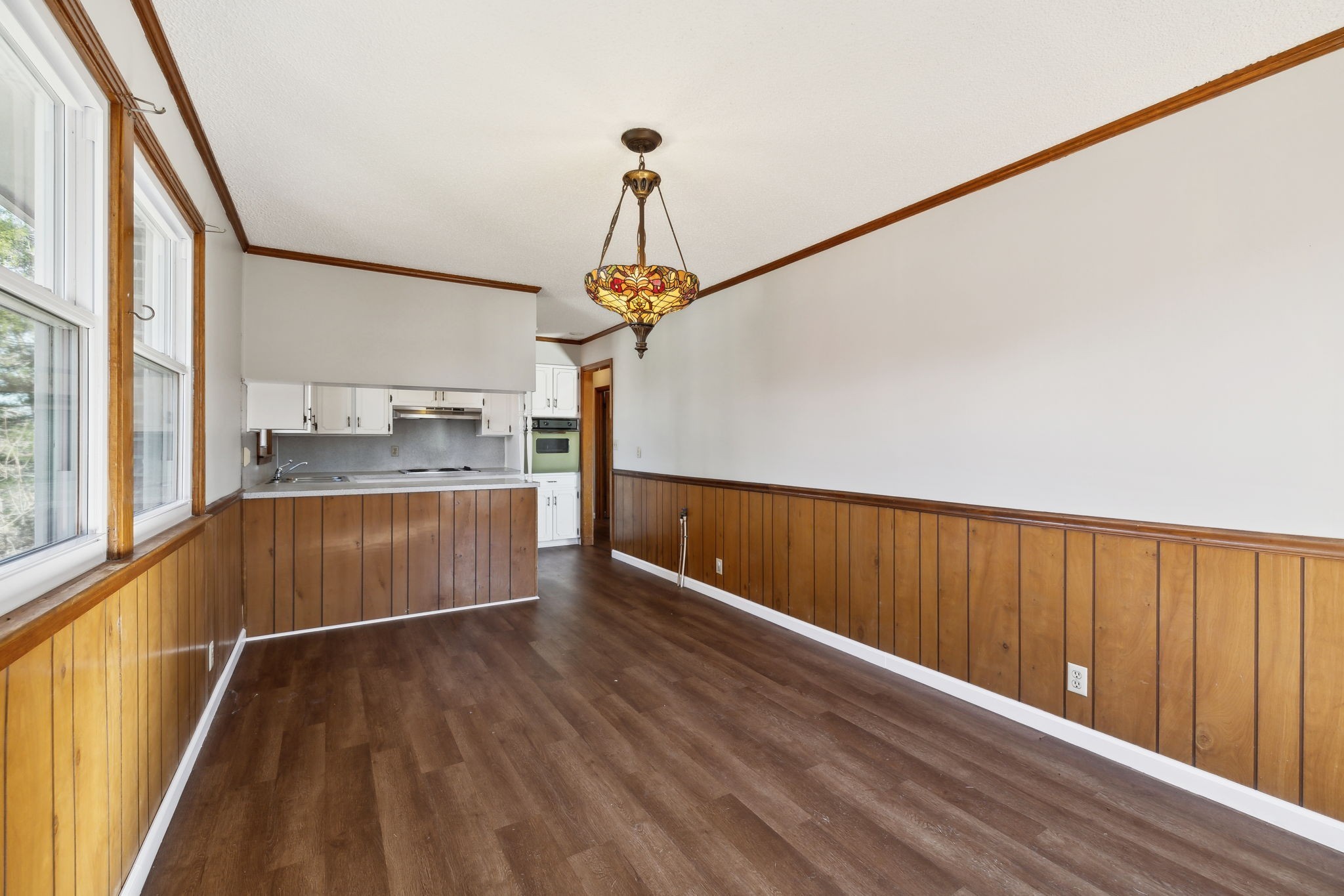 5880 Carthage Road Pleasant Shade, TN 37145 - Photo 8 of 45 a view of a kitchen with wooden floor and electronic appliances