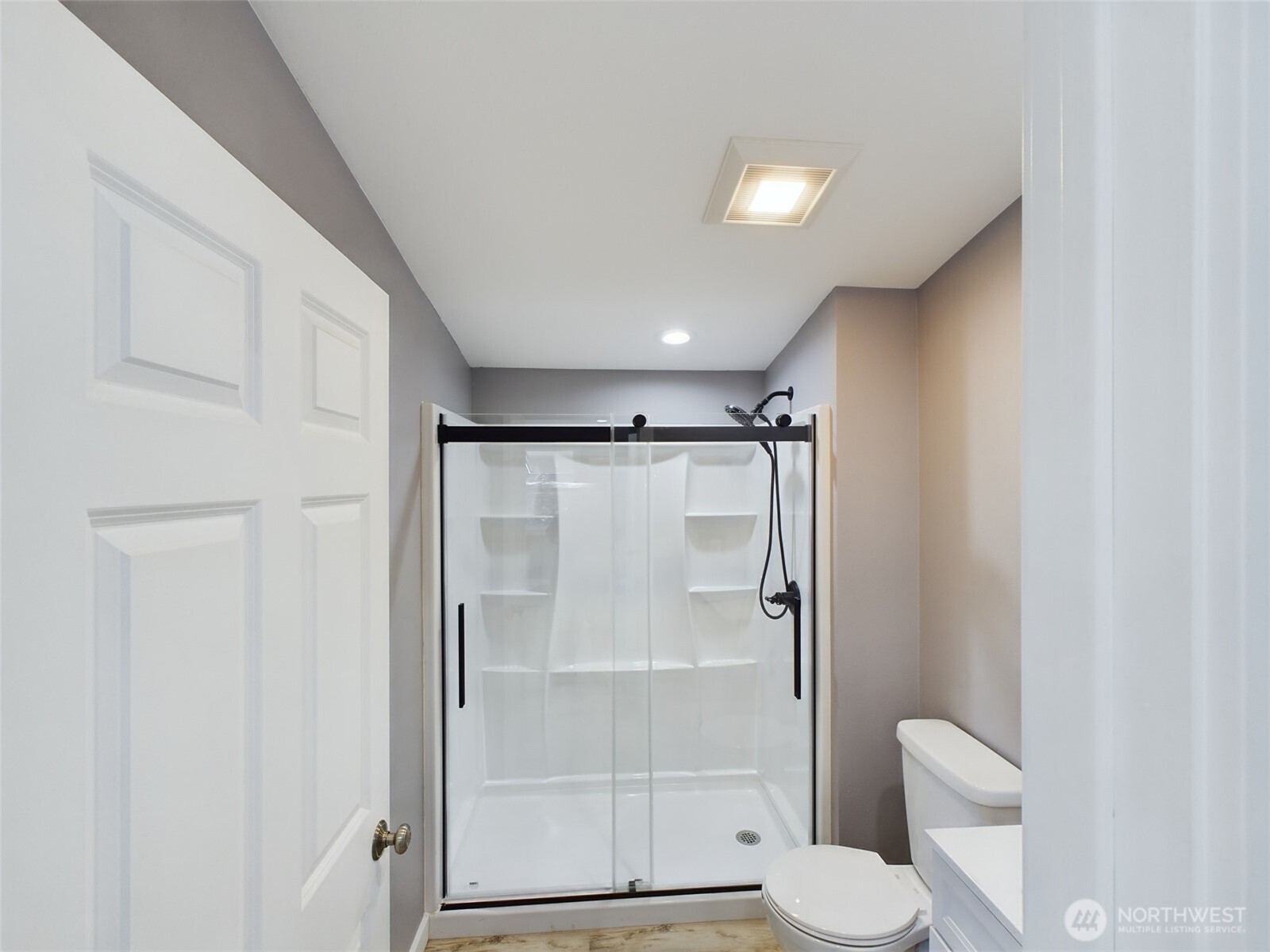 9 Pine Grove Street Republic, WA 99166 - Photo 7 of 13 a bathroom with a shower a toilet and a sink