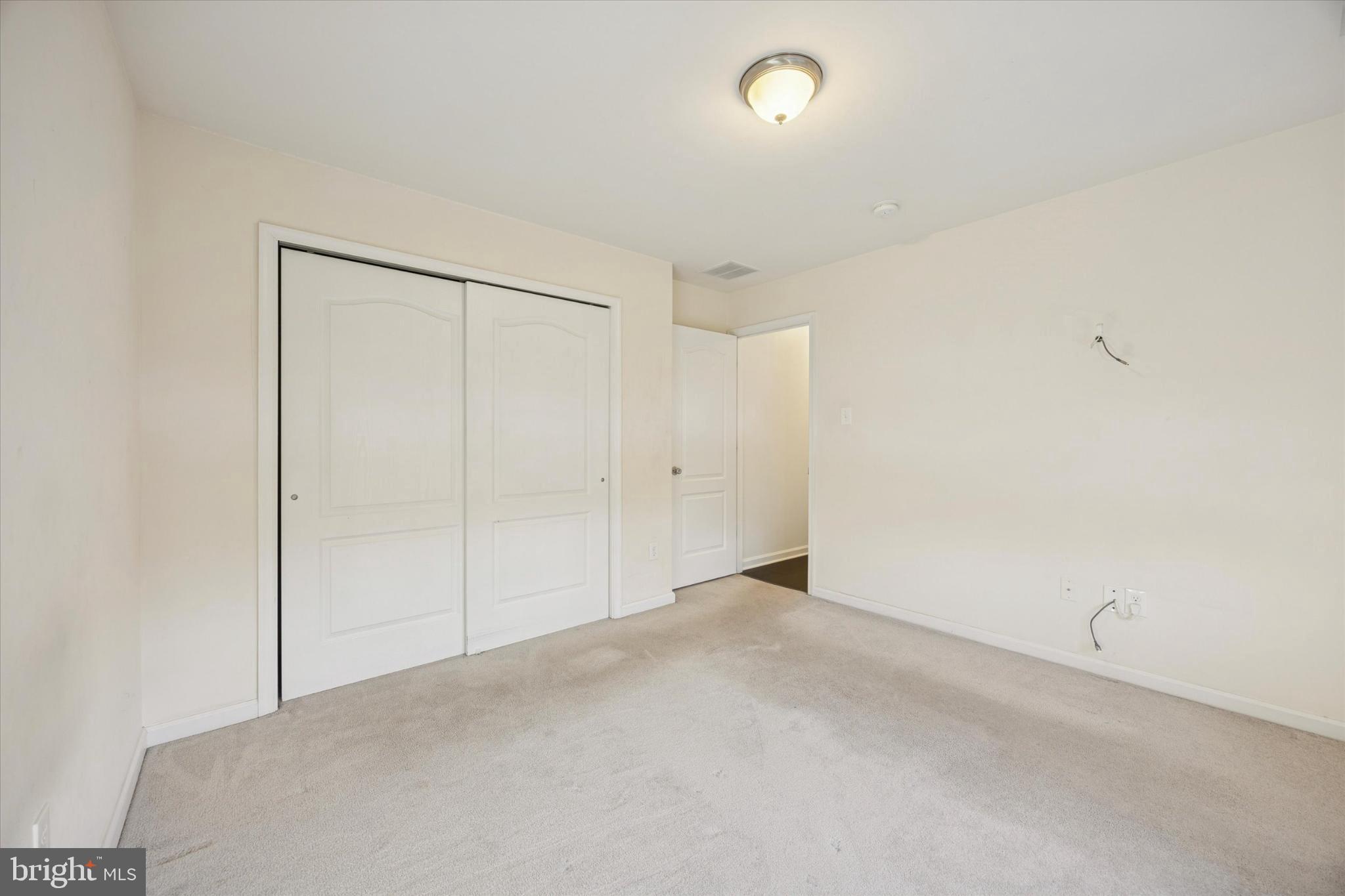 106 Nottingham Lane Newfield, NJ 08344 - Photo 13 of 29 an empty room with an entryway