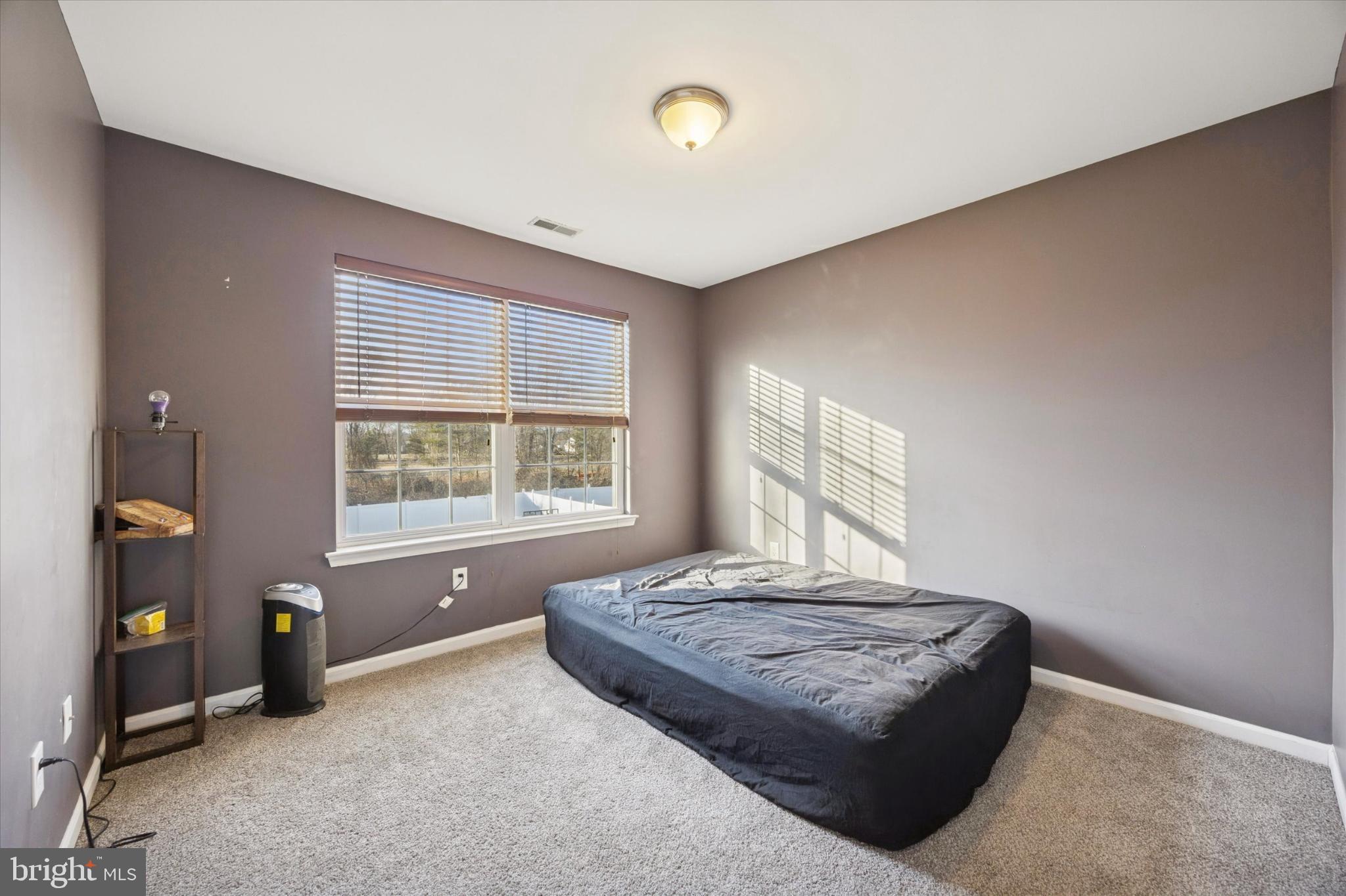 106 Nottingham Lane Newfield, NJ 08344 - Photo 14 of 29 a living room with couch and a window