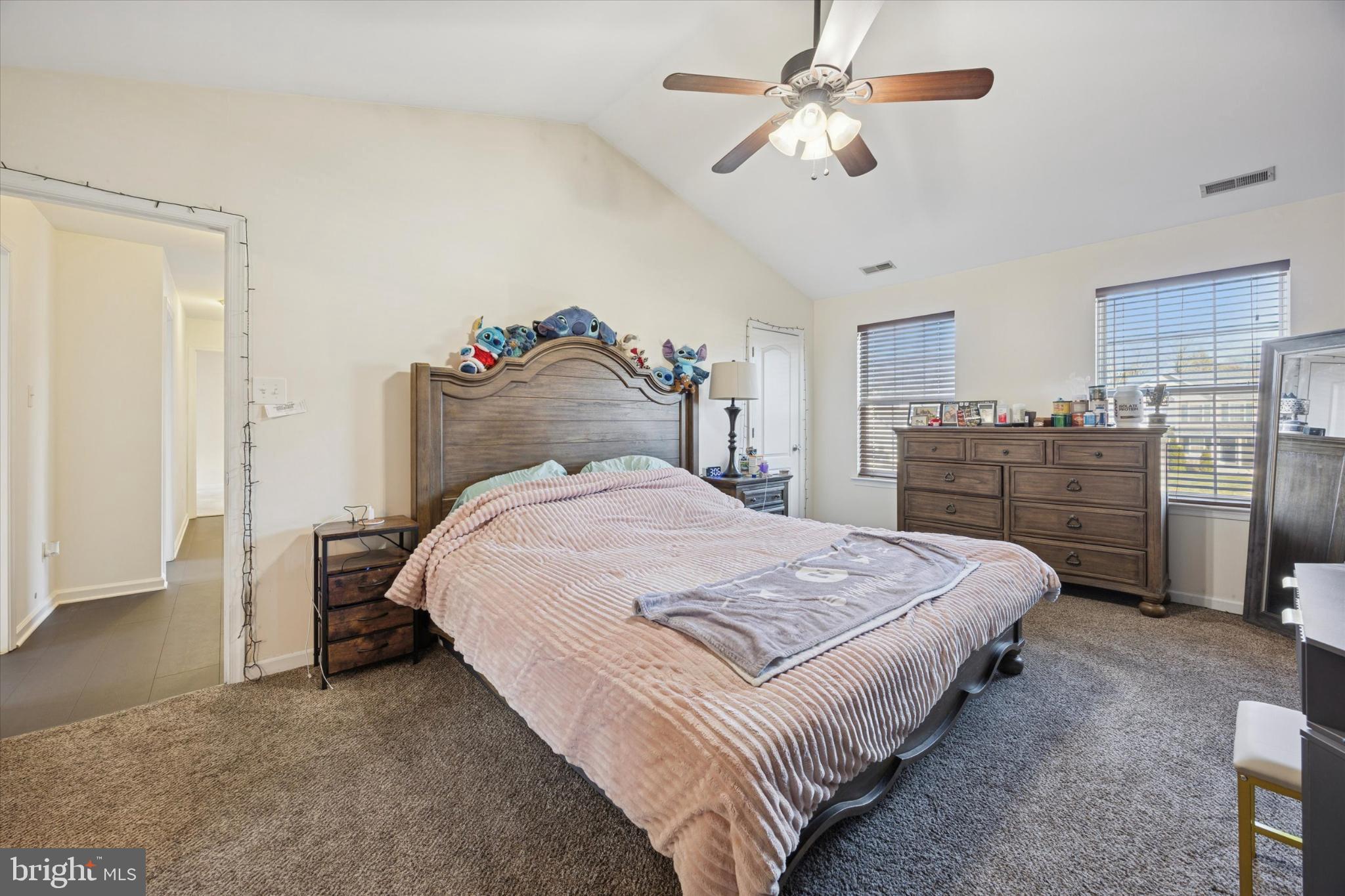 106 Nottingham Lane Newfield, NJ 08344 - Photo 19 of 29 a bedroom with bed and wooden floor