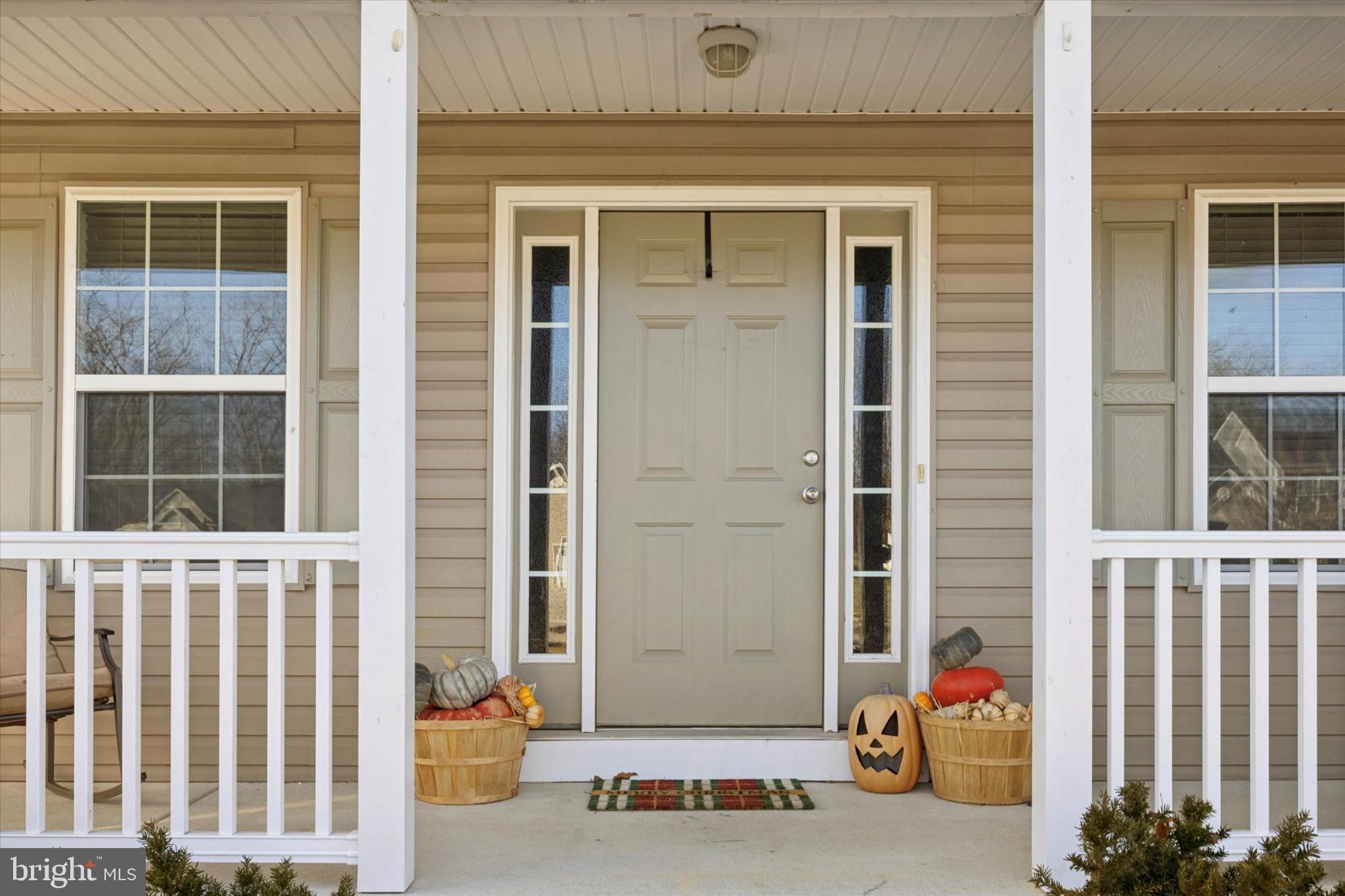 106 Nottingham Lane Newfield, NJ 08344 - Photo 3 of 29 a front view of a house with a large window