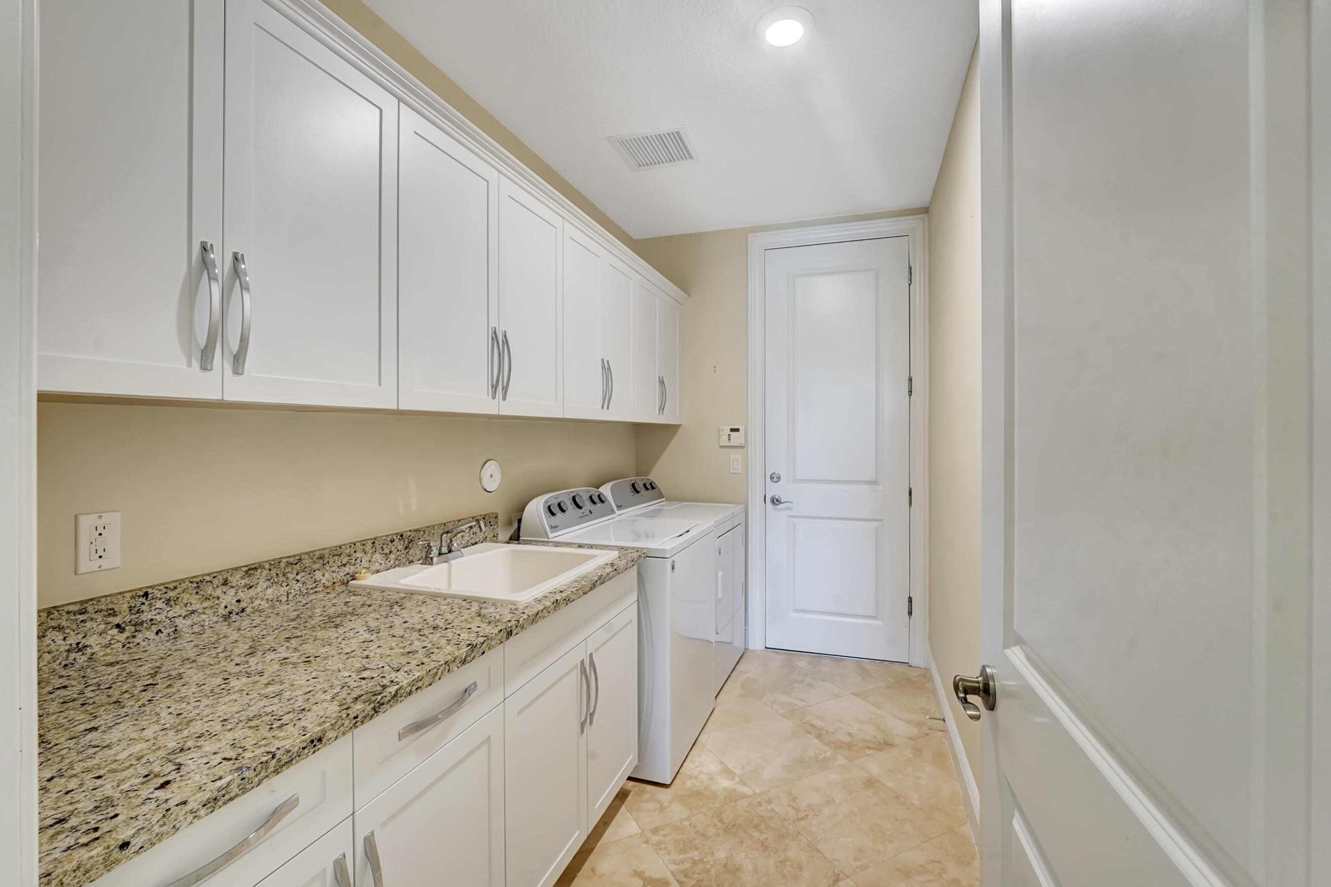 2565 Northwest 69th Street Boca Raton, FL 33496 - Photo 13 of 16 Laundry Room