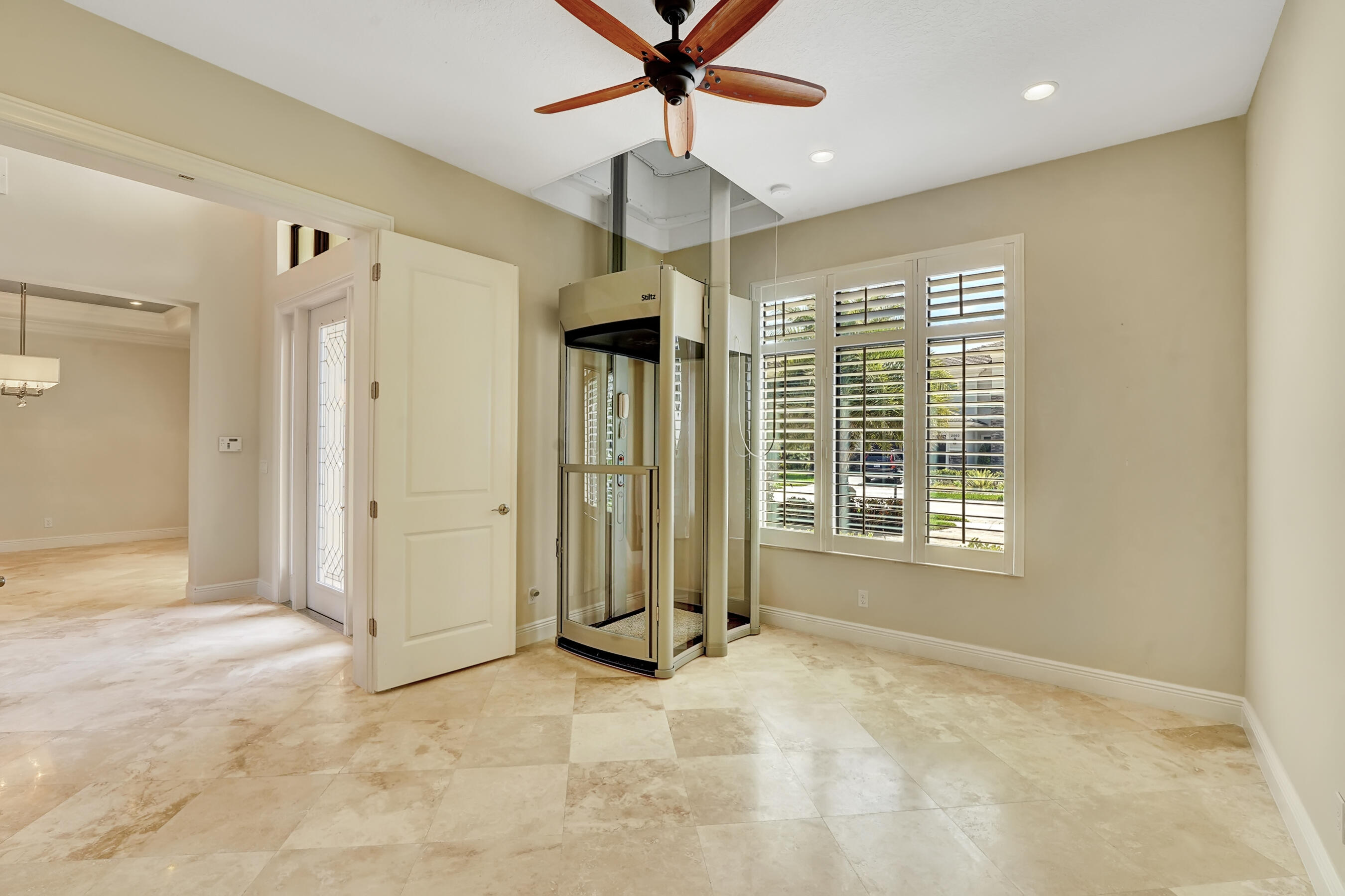 2565 Northwest 69th Street Boca Raton, FL 33496 - Photo 16 of 16 Elevator in the Study