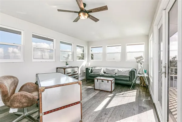 a bathroom with a shower a toilet and sink