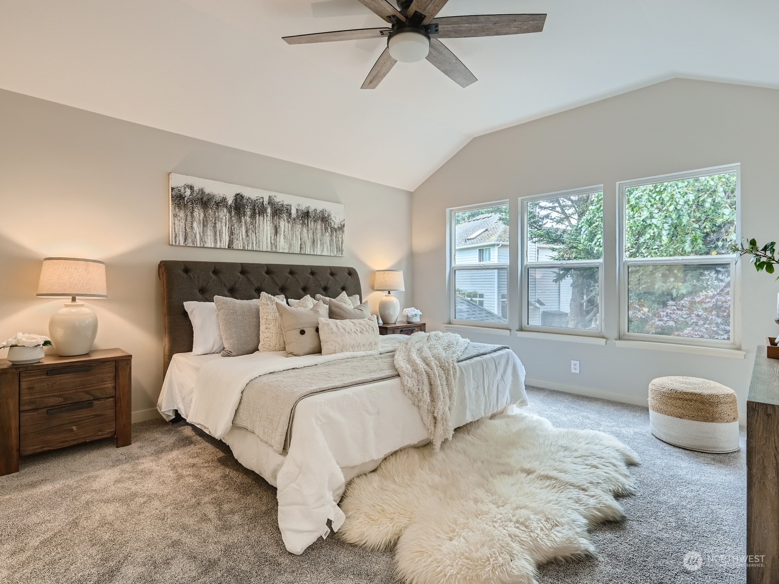 11216 39th Drive Southeast Everett, WA 98208 - Photo 20 of 40 a spacious bedroom with a bed and a large window