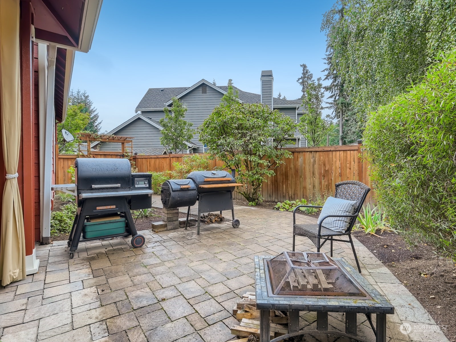 11216 39th Drive Southeast Everett, WA 98208 - Photo 34 of 40 a backyard of a house with table and chairs